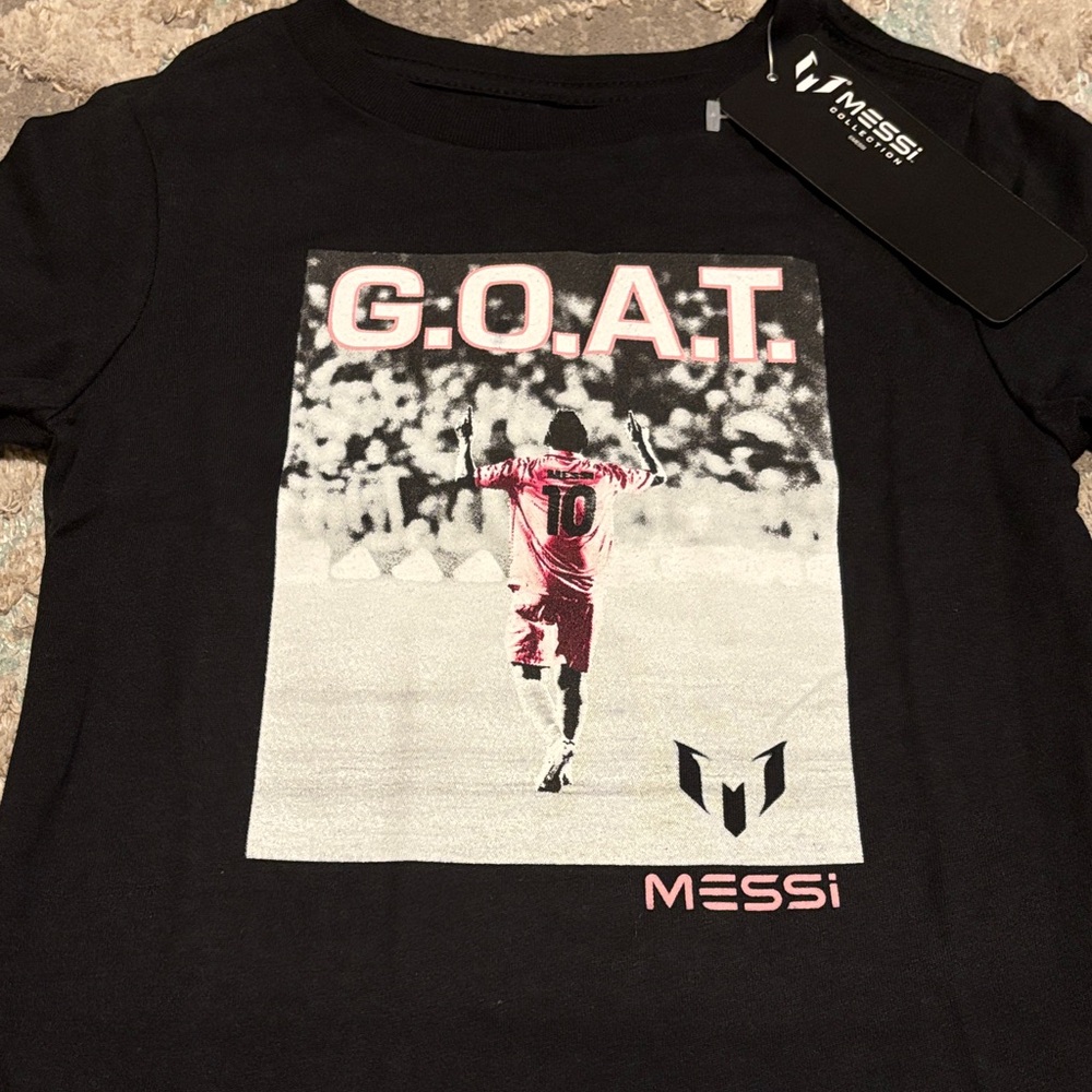 Messi Collection- Black G.O.A.T. Messi T-Shirt with Pink Graphic Highlights